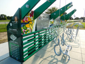 Outdoor fitness equipment and instructional signs.