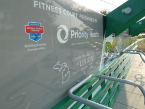 Outdoor fitness court sponsorship signage in Union Township.
