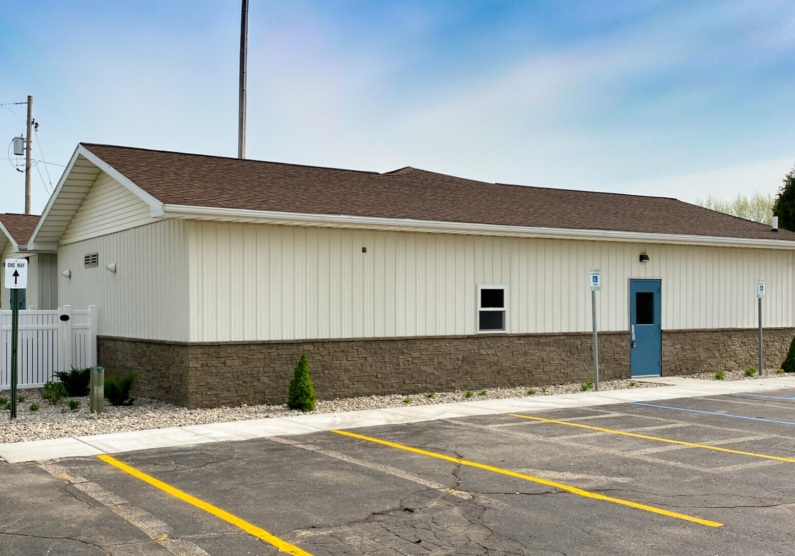 Single-story building with accessible parking spaces.