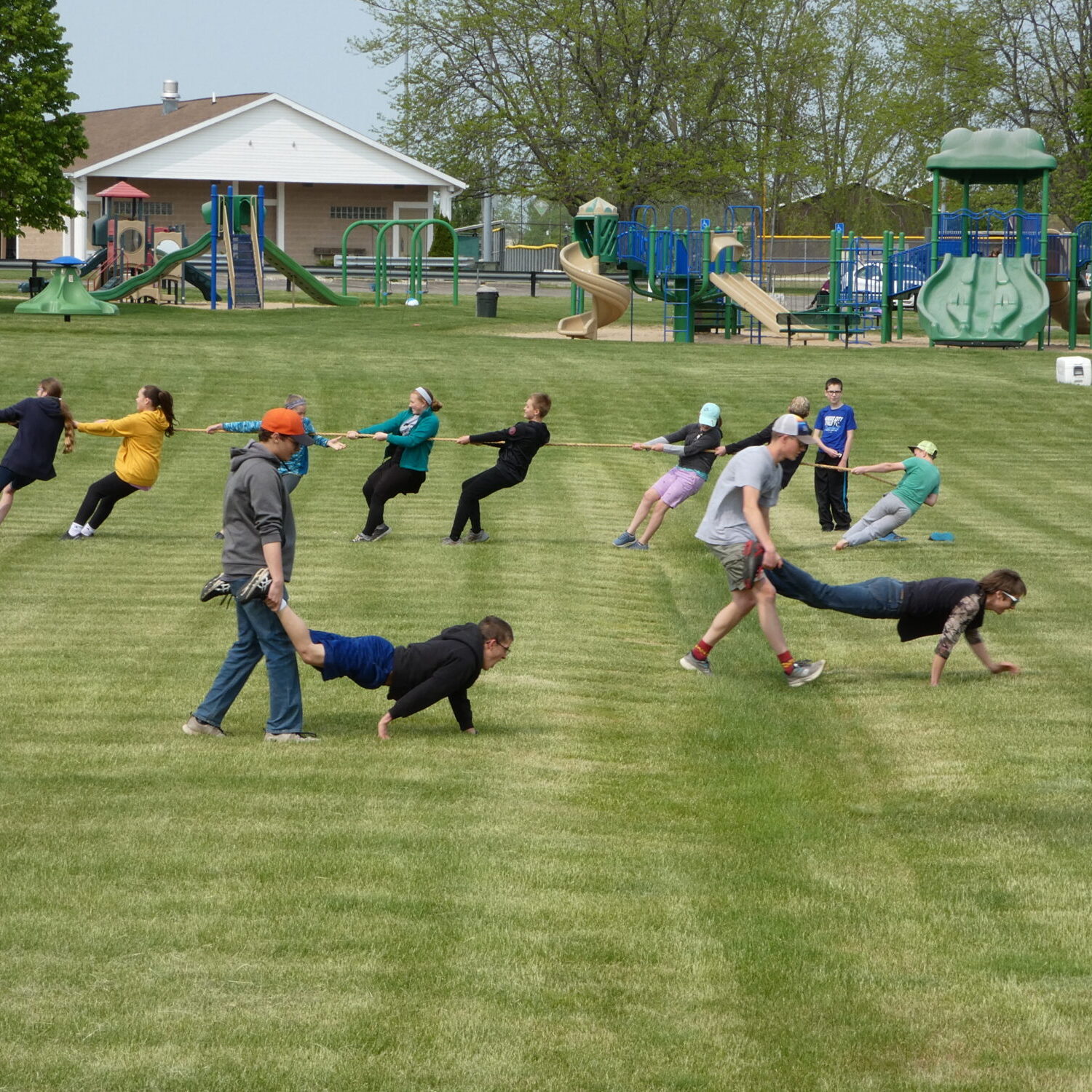 p1010152 Group playing tug of war at a park